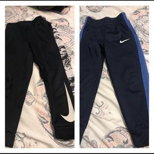 Two pairs of Nike pants size 4T
